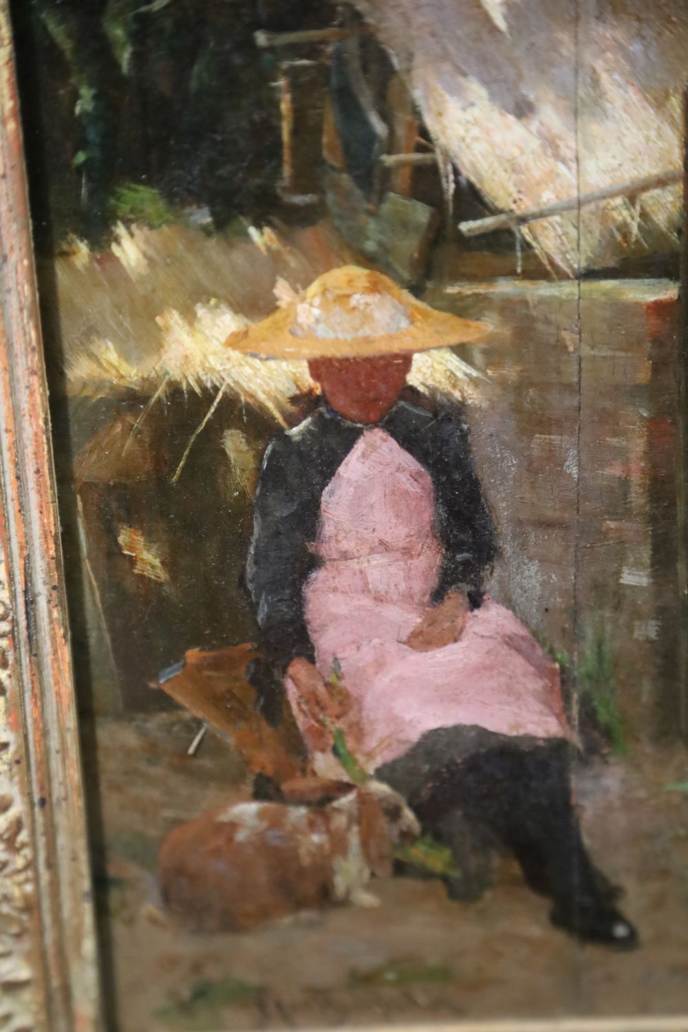 James Coutts Mitchie (1861-1919), oil on board, Garden scene with woman seated beside a rabbit, signed, 10 x 7in.